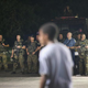 Police stand guard along Florissant Avenue in Ferguson, Mo., Aug. 21, 2014, in a bid to prevent a repeat of the unrest that followed the recent death of Michael Brown. The unarmed 18-year-old was shot and killed by a Ferguson police officer on Aug. 9.
Scott Olson/Getty Images